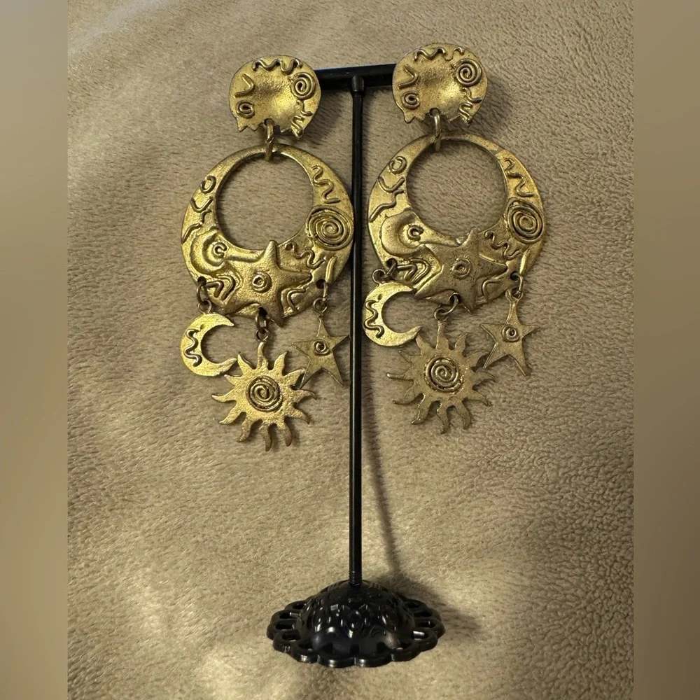 Moon, sun and stars earrings, bronze gold color. EUC, post back.